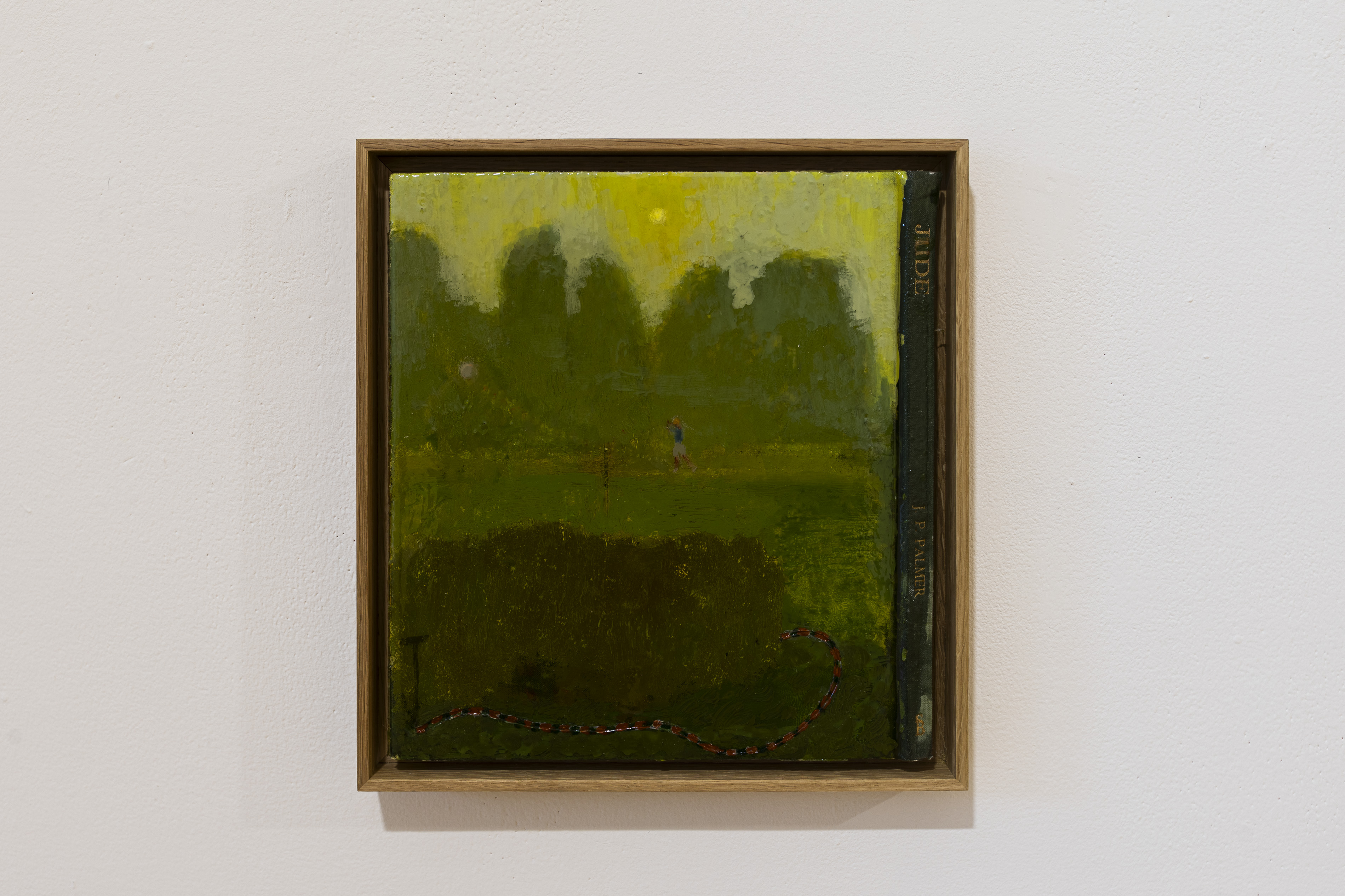 A small painting by Andrew Cranston or Lorna Robertson depicting a hazy green landscape with a golfer and a snake curling along the grass, incorporating part of a book spine reading "Jude" by J.P. Palmer into the composition.