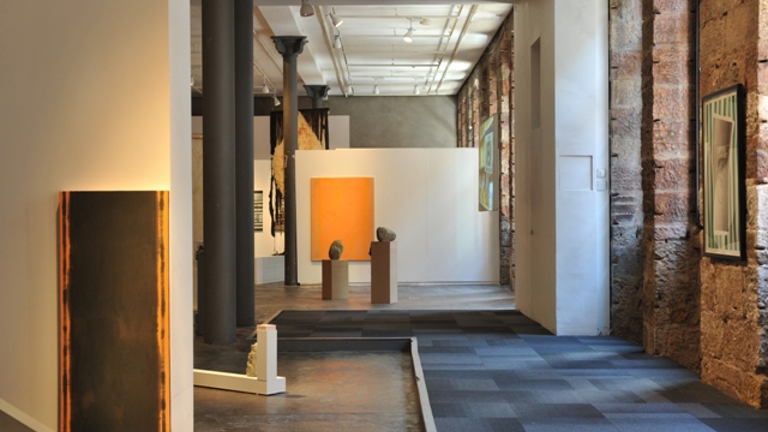 various artworks and installations in a gallery space