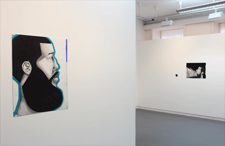 Some figurative images displayed in a white-walled gallery