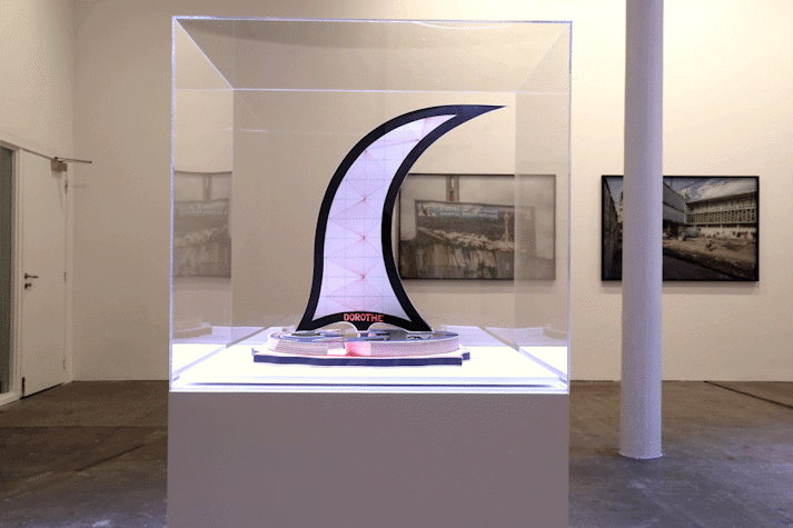 Installation view, photographs from the series Urban Now and sculptures of imagined buildings