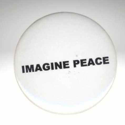 badge with the words Imagine Peace 