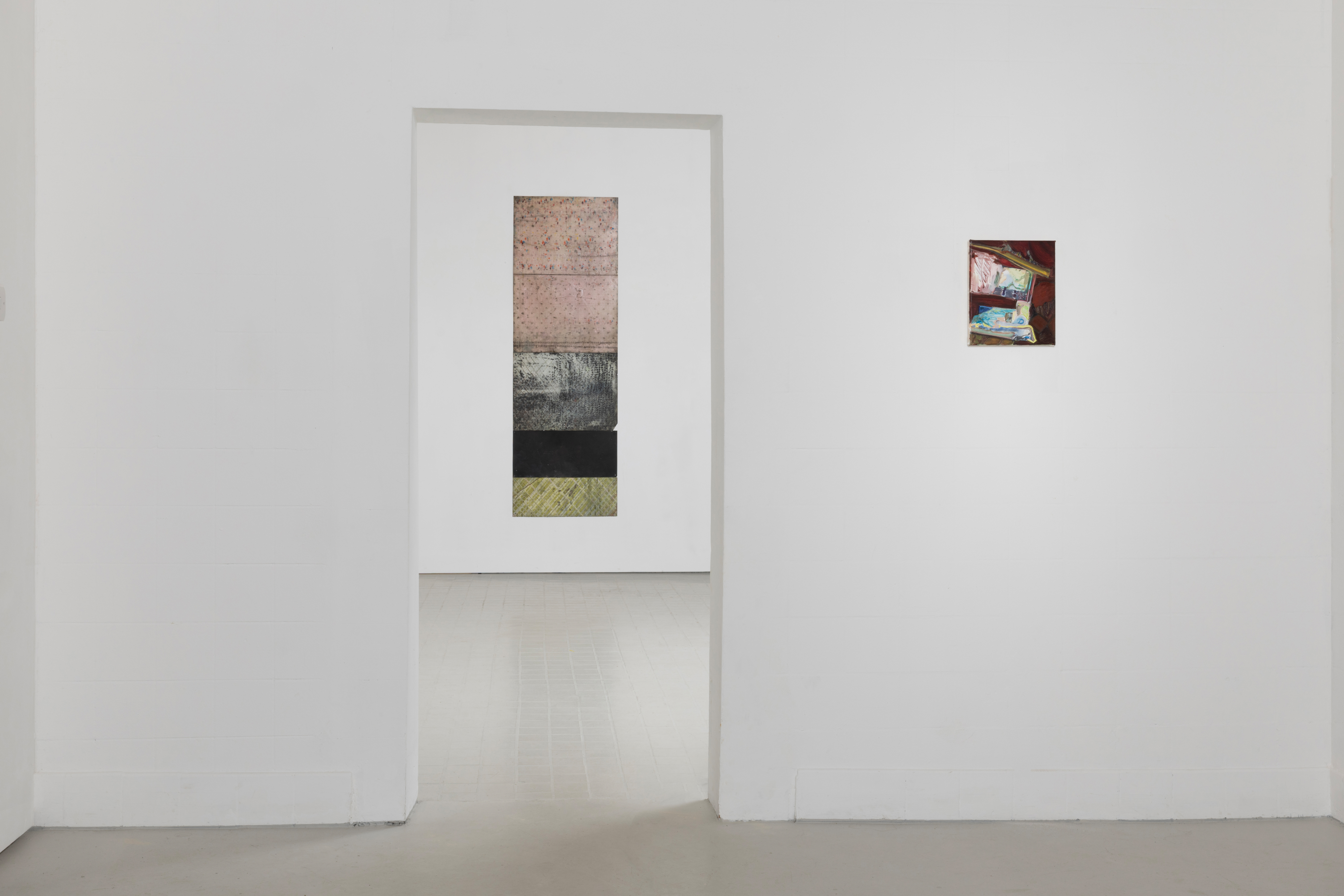 Installation view of "Daybook," showing a tall striped panel work by Anna Paterson through a doorway, with a small painting by Amelia Barratt on the adjacent wall.