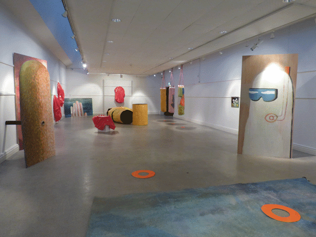 Coloured sculptural objects in exhibition space