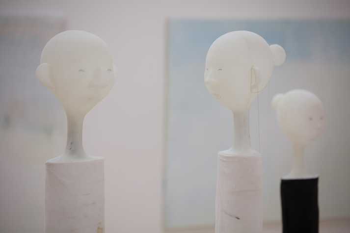 An image of three sculpted figures by Cathy Wilkes installed in a gallery space.