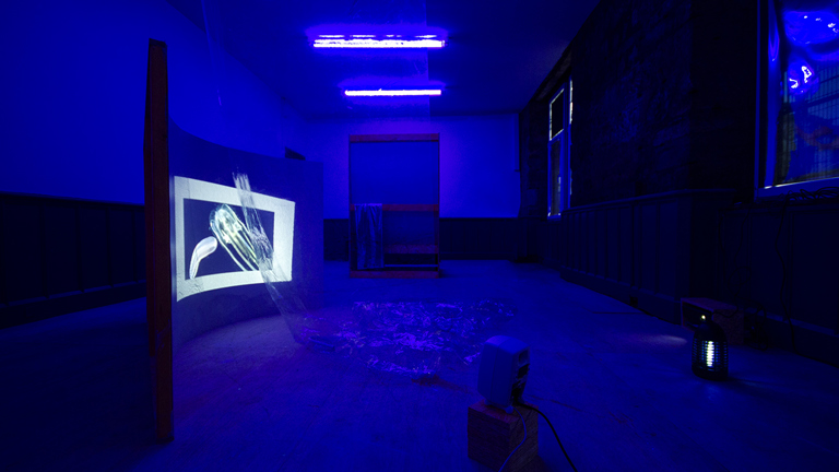 Multi faceted installation of sculpture, sound and film