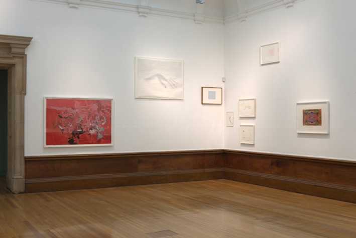 various framed works on paper hung in a room in the kelvingrove gallery.